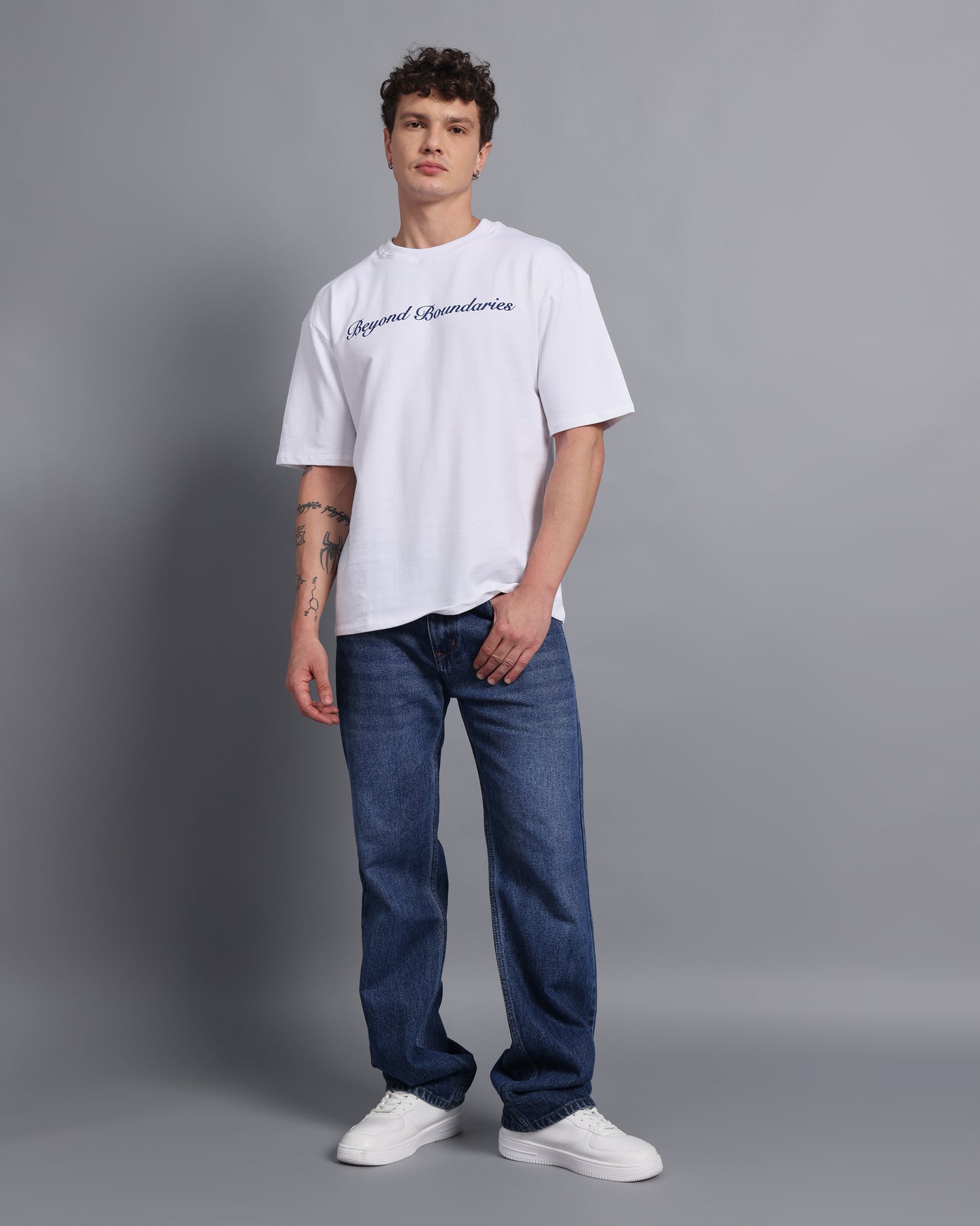 "BEYOND BOUNDARIES"- white oversized tee