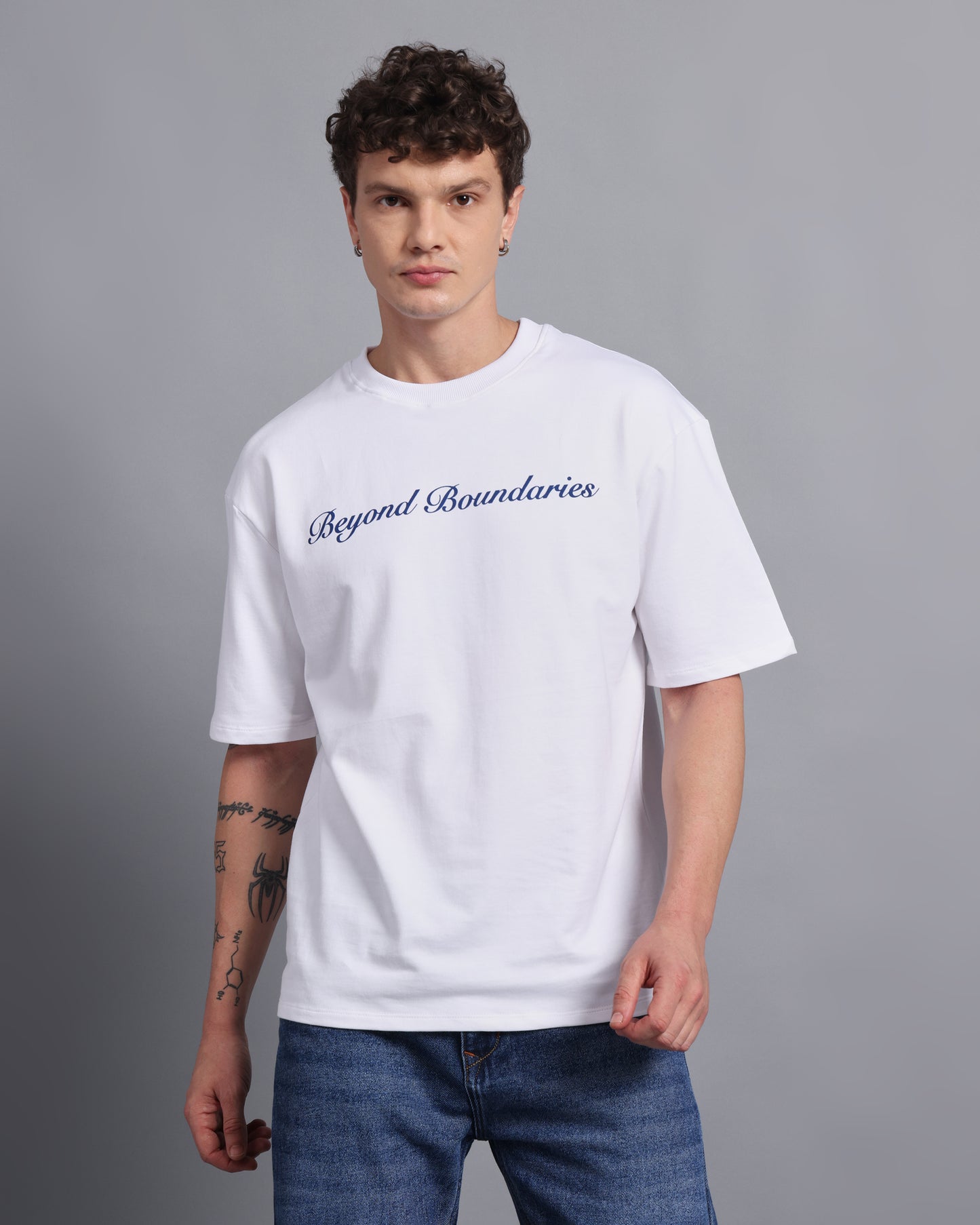"BEYOND BOUNDARIES"- white oversized tee