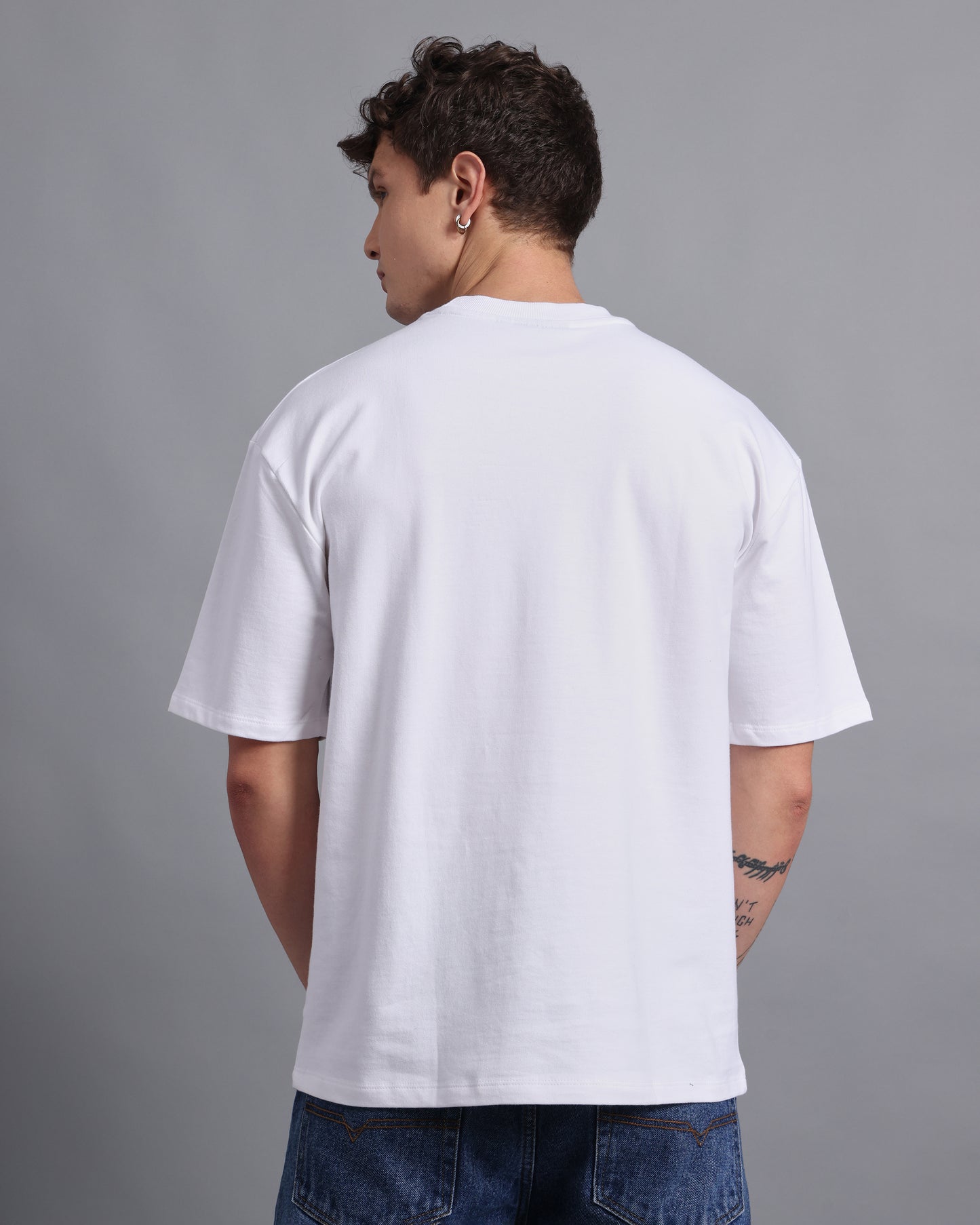 "TAMED BEYOND?"- white oversized tee