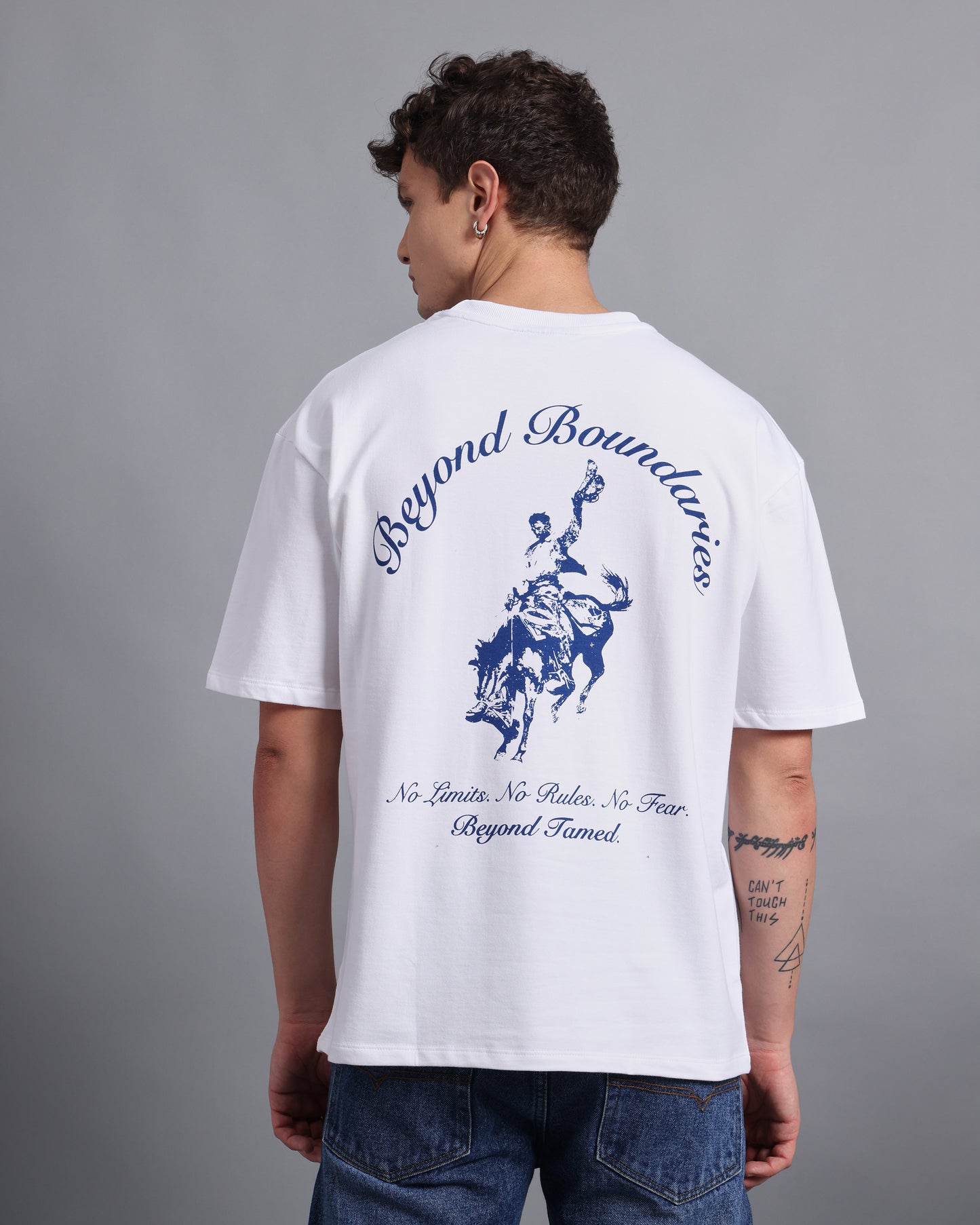 "BEYOND BOUNDARIES"- white oversized tee