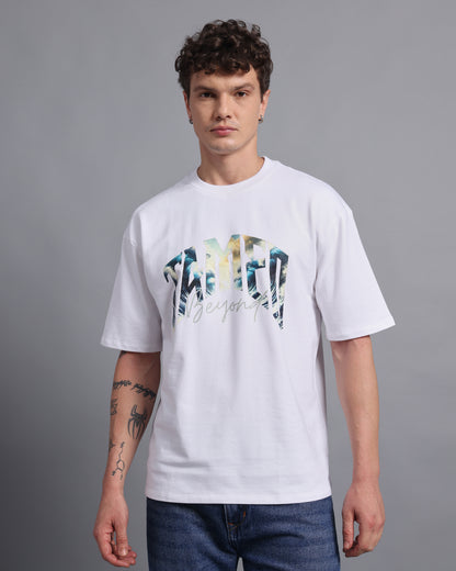 "TAMED BEYOND?"- white oversized tee